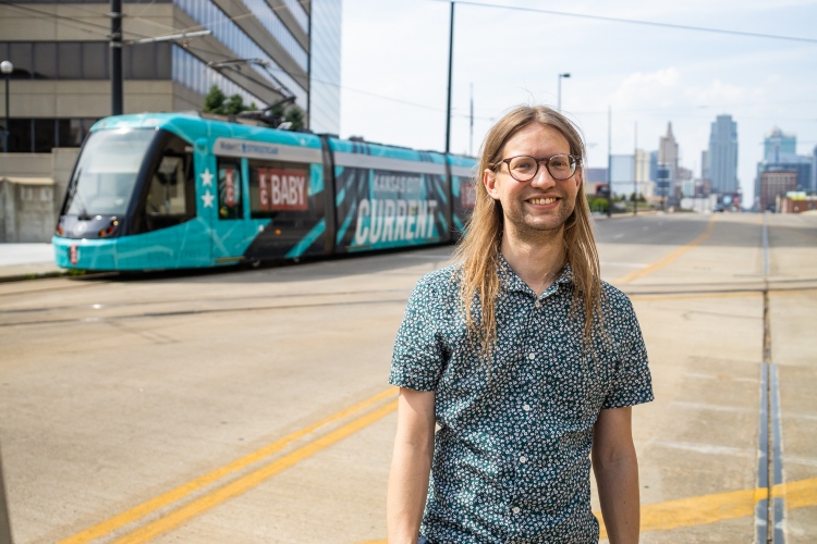 Ian Blair in front of KC Streetcar