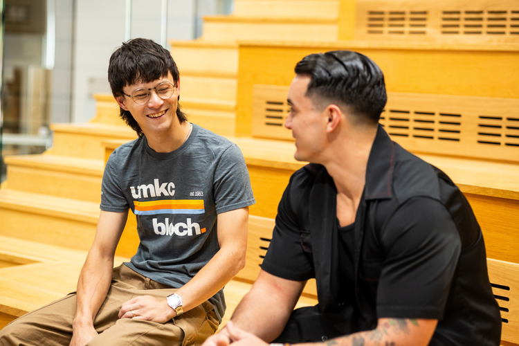 Charles McGraw sits with his former co-worker.