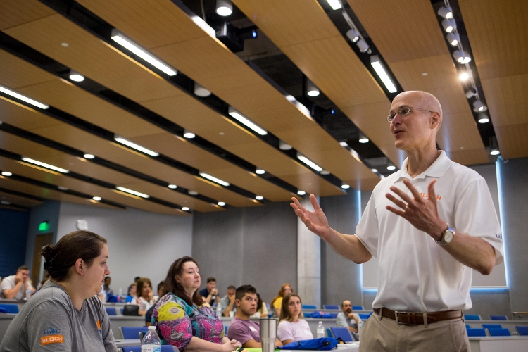 Dean Brian Klaas addresses students in a classroom