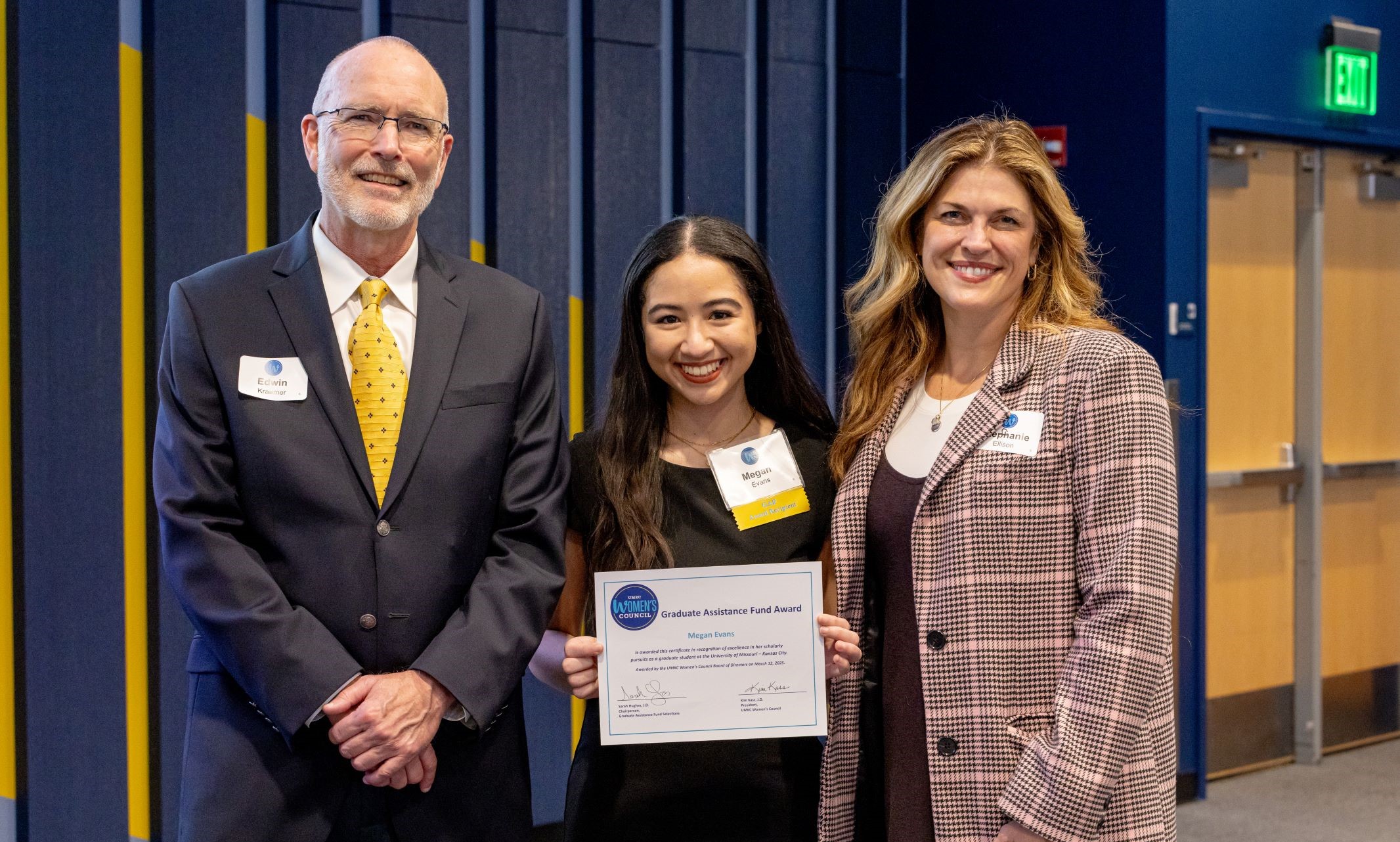 GAF recipient Megan Evans smiling holding her award