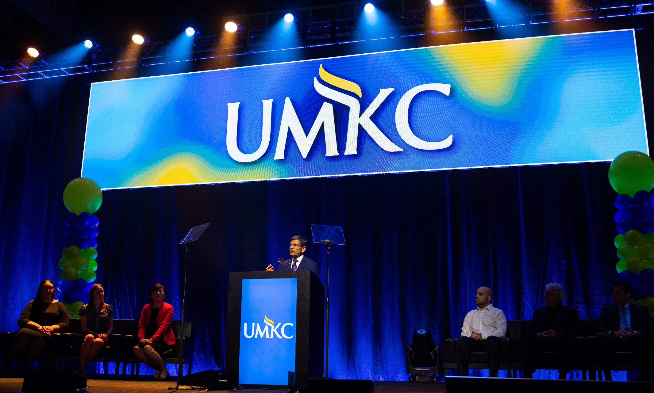 Chancellor Agrawal speaks behind a podium