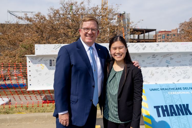 Dental student with school of dentistry dean